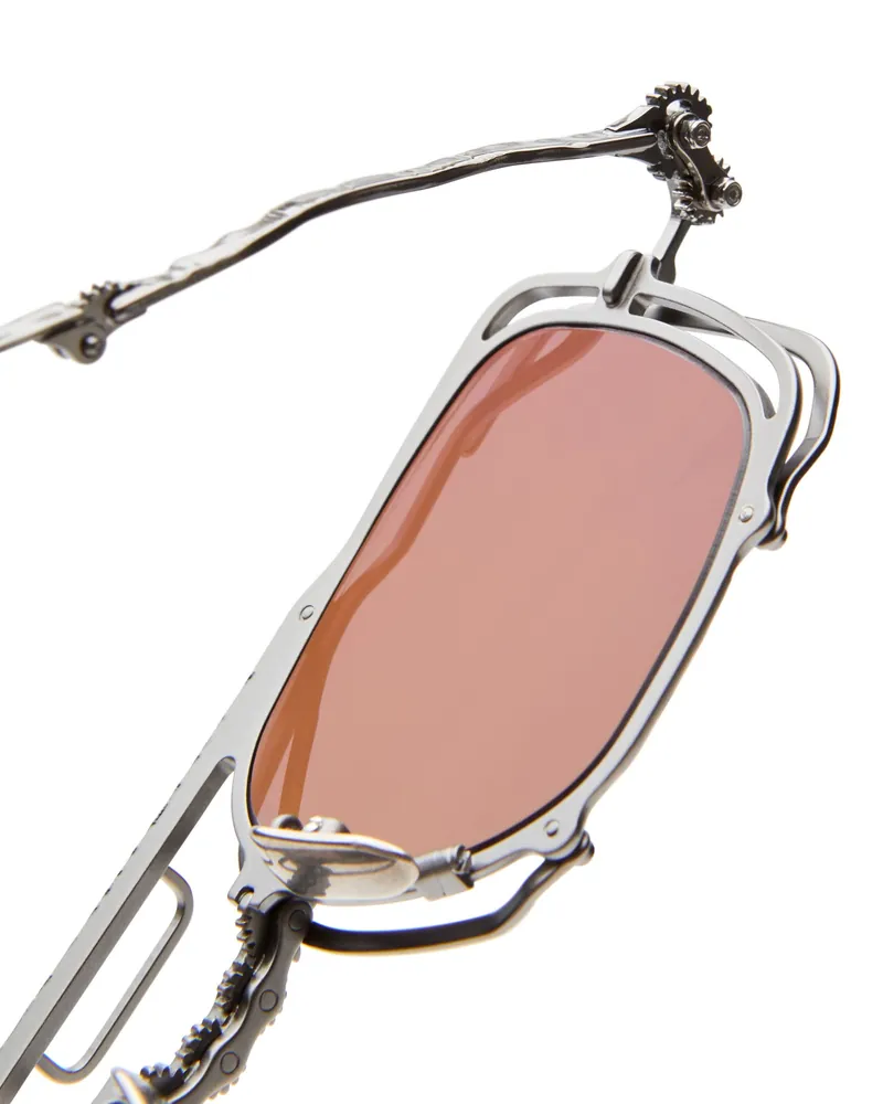 Kuboraum, verres rosés, monture ajourée